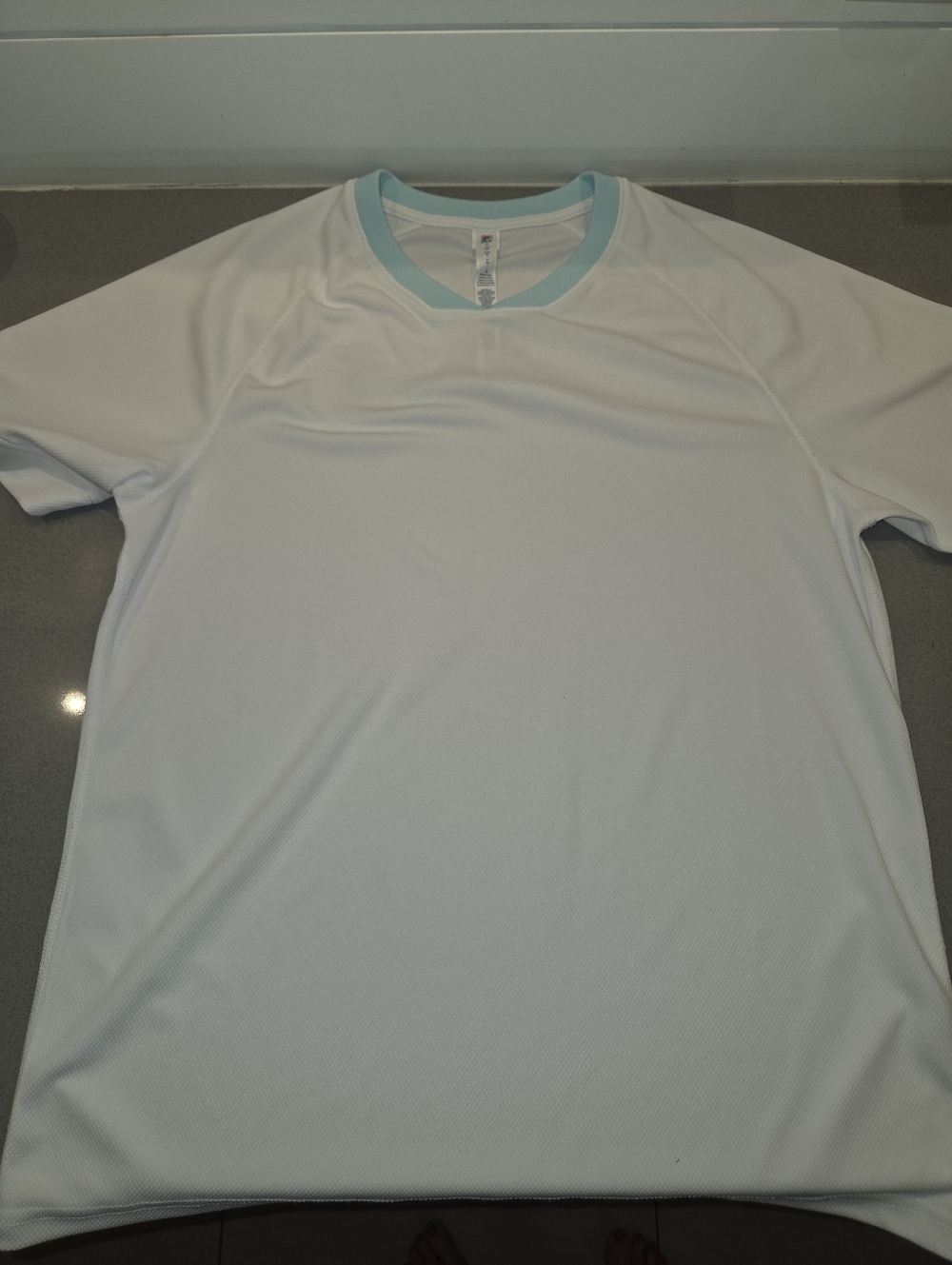 Fila White V-neck Shirt with Brown Leather Logo Patch